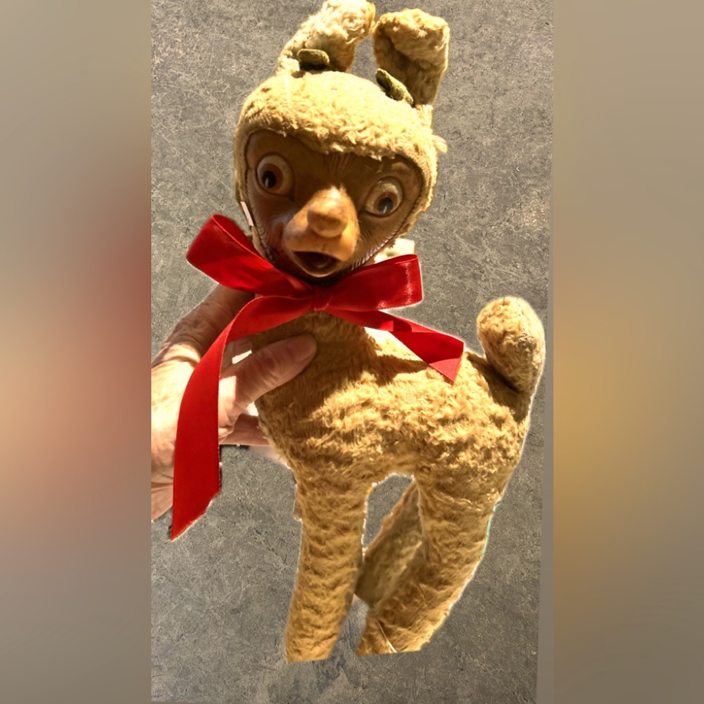 1950’s Rudolph with his red nose rubbed off. 
Rubber face.